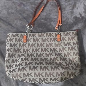 Mk medium size tote! Burnt orange handles